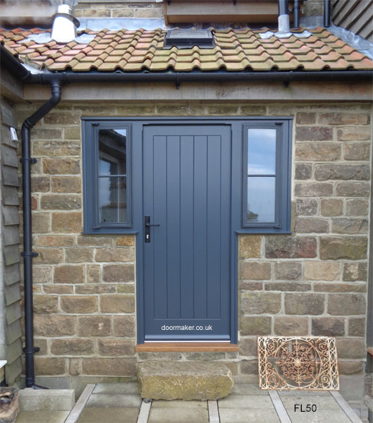 grey cottage door with side windows