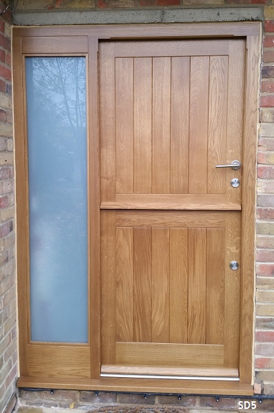 european oak stable door and frame with sideligt